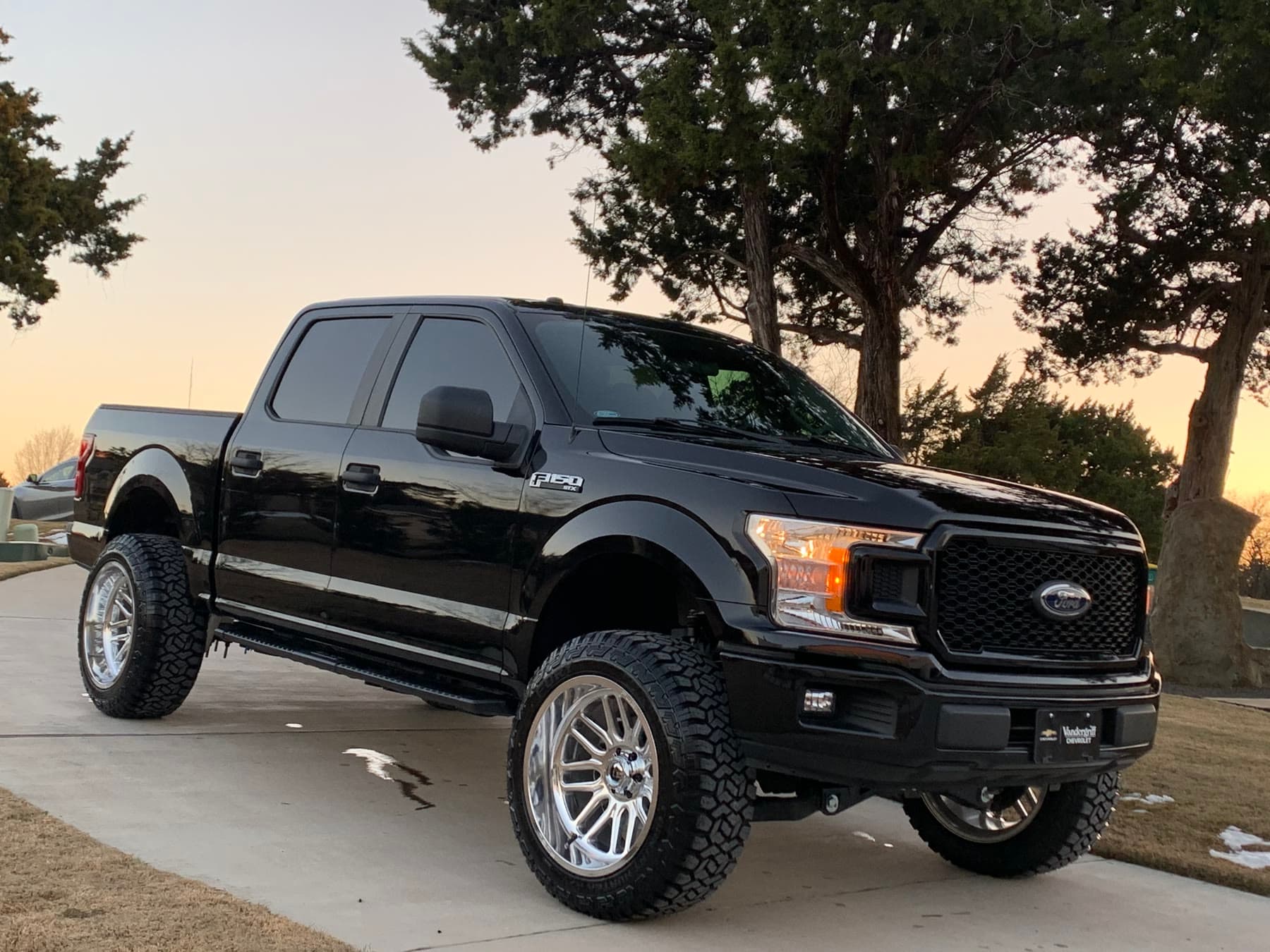 Mr. Nickels' black Ford F-150 after its custom upgrades